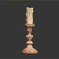 Vintage Brass Candlestick With Burned Candle And Intricate Decorative Base