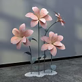 Pink Paper Floral Installation With Green Stems Leaves And White Base For Interior Decor