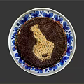 Chocolate Cake With Golden Cream Topping And Colorful Sprinkles On Blue And White Plate