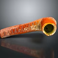 Ceramic Handcrafted Orange Textured Pipe with Green Interior and Carved Design