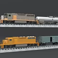 Gray and Yellow Model Trains with Silver Tank Car and Blue Freight Car