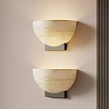 Elegant Modern Cream Marble Wall Sconces Illuminated On Light Wall 3d model