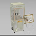 Gashapon Machine With Transparent Window Next To Easel Holding Decorative Picture Frame