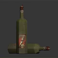 Green Glass Bottle With Red Cap And Decorative Gold Pattern Box On Black Surface