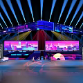 Modern Stage Setup With Blue Purple Lights Large Cityscape Screens And Reflective Floor