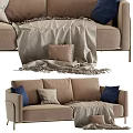 Two Seater Sofa With Beige Upholstery Blue Brown Pillows And Soft Blanket