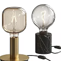 Modern Table Lamps with Gold Metal and Black Marble Bases and Transparent Glass Bulbs