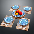 Elegant Dinnerware Set With Blue White Patterned Plates Woven Placemats Knives Forks And Fruits