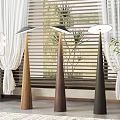 Modern Floor Lamps With Conical Bases In Three Colors By Window Blinds And Green Plants
