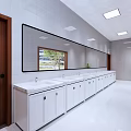 Public Restroom With White Tile Walls Long Mirror White Sinks And Potted Plants