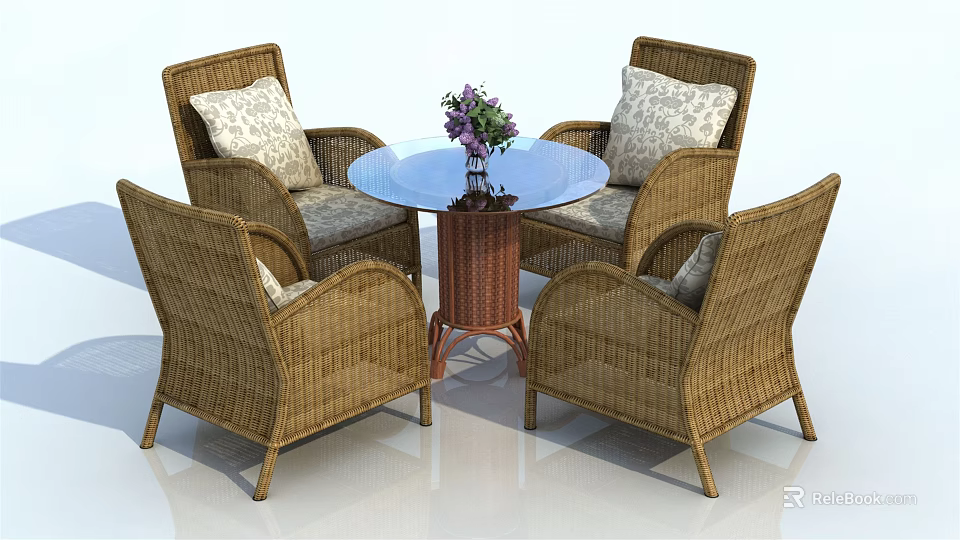 Round Wicker Outdoor Table with Four Chairs Cushions and Flower Vase 3d model 