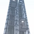 Twin Glass Elevator Shafts In Modern High Rise Building Design