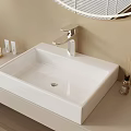Modern Bathroom Sink Area With White Square Basin Silver Faucet And Skincare Products