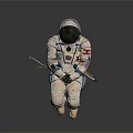 Man In White Spacesuit With Red White Blue Patches Floating Against Dark Background
