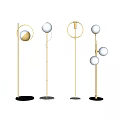 Modern Floor Lamps With Golden Metal Stands Spherical Heads And Circular Elements