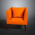 Orange Fabric Armchair With Matching Pillow And Wooden Legs For Living Room