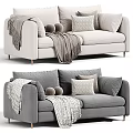 Beige And Gray Upholstered Sofa Interior With Pillows Blanket And Pom Poms