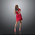 Red Dress Woman Holding Camera Against Grey Background With Pink Heels
