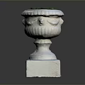 Stone Planter With Carved Details And Square Base Featuring Green Top