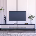 Modern TV Stand With Flat Screen TV Storage Drawers And Decorative Plants In Living Room