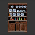 Dark Wooden Sideboard With Shelves Blue White Patterned Plates Colorful Bottles And Gold Handles