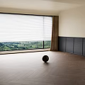 Herringbone Wooden Floor in Bright Room with Large Window Blinds Brown Curtains Black Cabinets and Green Landscape
