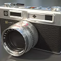 Vintage Yashica Digital Camera With Silver Body And Xenar Lens Design