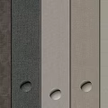 Various Textile Fabric Panels In Neutral Tones With Round Decorative Knobs