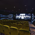 Modern Cinema Interior With Yellow Seats And Large Projection Screen 3d model