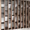 Modern Room Divider With Wooden Frame And Textured Metallic Geometric Panels