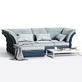 Light Blue Sectional Sofa with Dark Blue Accents Gray Pillows Throw Blanket and Coffee Table