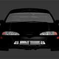Black Two Door Sports Car With Rear Spoiler Silver Wheels Sleek Body Grey Background Reflection