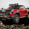 Red Pickup Truck On Off Road Terrain With Roof Lights