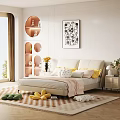 Double Bed With White Leather Headboard Yellow Pink Pillows Light Sheet And Flower Shaped Dolls