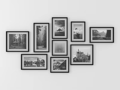 Stylish Black Framed Photo Wall With Irregular Arrangement And Black And White Landscape Building 3d model