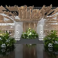 Contemporary Exhibition Display With Wooden Stick Structure Green Plants White Flowers Models And Water Reflection