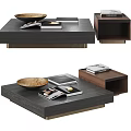 Modern Dark Coffee Table With Stacked Books Magazines And Decorative Bowl
