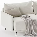 Stylish Beige Two Seater Sofa With Gray Brown Beige Pillows And Gray Blanket