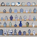 Various Decorative Ceramic Vessels With Diverse Patterns And Shapes On Display Shelves