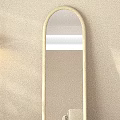 White Arched Floor Mirror in Beige Wall Room with Floor Lamp Wooden Floor and Curtains