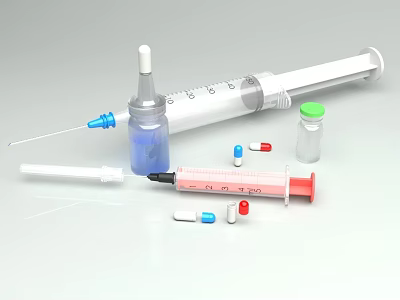 Medical Supplies Including Syringe Vial And Colorful Capsules On White Surface 3d model