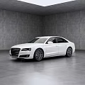 White Audi Luxury Sedan Parked In Minimalist Gray Interior With Skylight And Spacious Floor