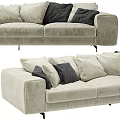 Modern Beige Upholstered Sectional Sofa With Dark Accent Pillows And Metal Legs