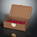 Decorative Ornament Set In Open Brown Box With Red Lining And Gold Clasp