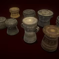 Traditional Musical Drums With Artistic Paintings Carved Patterns And Various Sizes In Brown Gray Tones