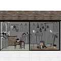 Clothing Store Window Display With Mannequins Hanging Garments And Decorative Plants