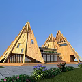 Modern Wooden Hotel Building With Triangular Roofs Large Windows And Front Lawn Area