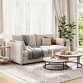 Bright Modern Living Room Interior With Light Gray Sofa Throw Pillows And Round Coffee Tables
