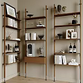 Wooden Bookcase With Multi Tiered Shelves Holding Books Statues Photo Frames And Decorative Items