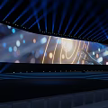 Modern Stage Design With Blue Lighting Large LED Screen And Audience Seats
